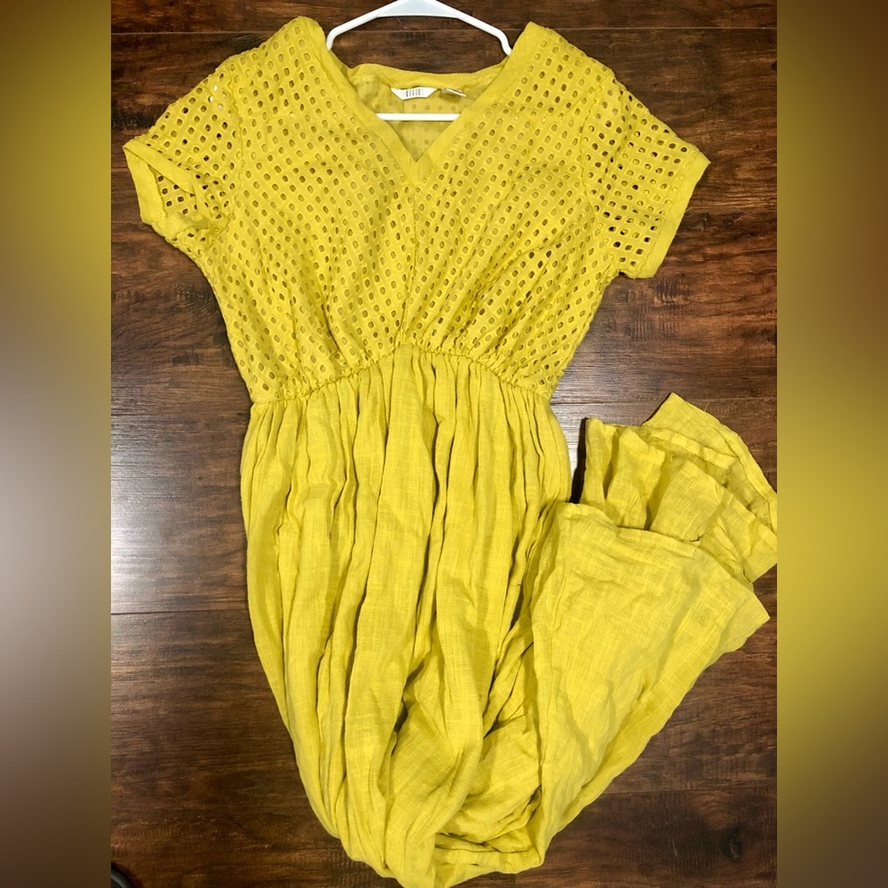 Golden Yellow Boho Maxi Dress with a v-neckline and perforated top features.